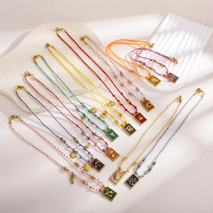 Handmade zodiac constellation necklace with gold plated enamel pendant and colorful cords
