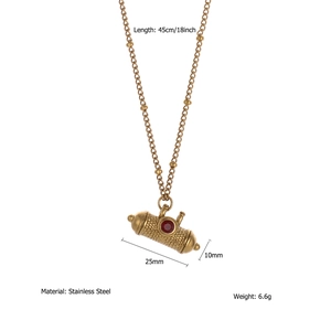 Detail view of oval stainless steel pendant with red gemstone and 45cm chain specs
