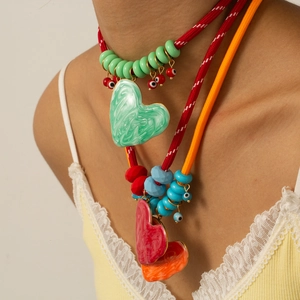 Colorful cotton rope layered necklace with enamel heart pendants and evil eye charm beads