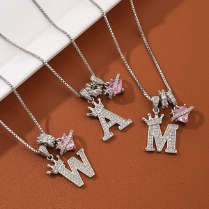 Copper crown initial necklace with cubic zirconia pendants and pink heart charms