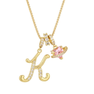 Gold plated initial K necklace with pink heart planet pendant and sparkling white zircons