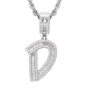 Detailed macro view of iced out silver letter D hip hop pendant with cubic zirconia
