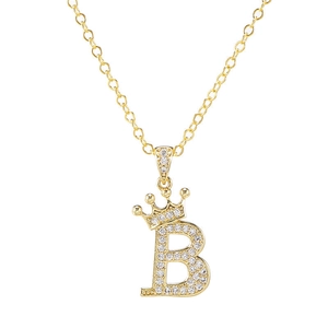 Close-up of golden crown initial B pendant with sparkling cubic zirconia inlay
