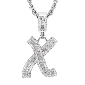 Detail of silver-colored letter X hip hop pendant with baguette-cut sparkling cubic zirconia