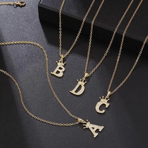 Hip hop crown initial necklace with gold plated copper and sparkling cubic zirconia stones