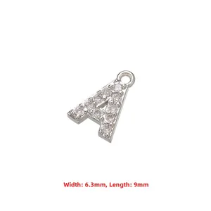 Macro detail of cubic zirconia letter A pendant showing 6.3mm width and 9mm length