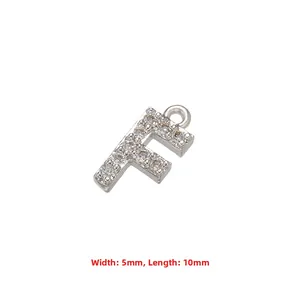 Detail of silver letter F pendant with cubic zirconia, measuring 5mm by 10mm