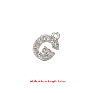 Silver letter G pendant with cubic zirconia inlay, measuring 6.4mm wide by 9.4mm long