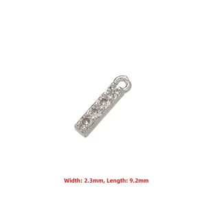 Macro detail of silver rectangular pendant with five micro-set cubic zirconia stones