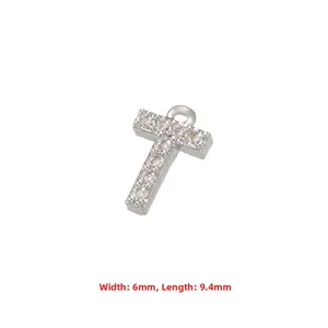 Detail of silver letter T pendant with zircon inlays measuring 6mm by 9.4mm