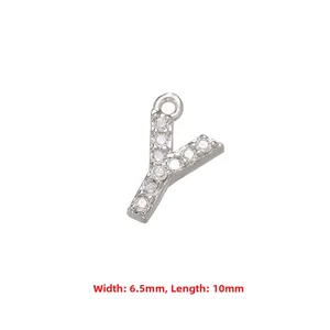 Macro shot of silver letter Y pendant with zircons showing dimensions 6.5mm by 10mm