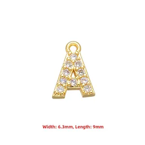 Close-up of a gold-plated letter A charm with cubic zirconia for DIY jewelry making