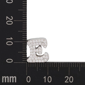 Detail showing letter C pendant size with 10mm measurement on a black scale