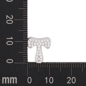 Macro shot of silver letter T pendant with cubic zirconia, size scale showing 15mm height
