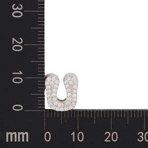 Macro shot of a U-shaped zircon pendant measuring 12mm by 10mm for DIY jewelry making