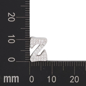 Detailed size view of silver letter Z charm with zircon pavé measuring 10mm by 12mm