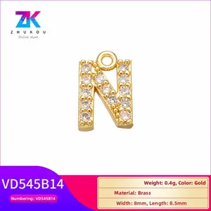 Macro detail of gold plated brass letter N pendant with cubic zirconia, size 8mm by 8.5mm