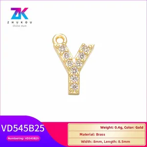 Macro view of gold-plated brass letter Y pendant with white zircon inlays, 8mm size