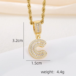 Detail view of 18k gold plated letter C pendant with baguette and round zircons