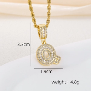 Macro shot of 18k gold plated letter Q pendant with cubic zirconia stones and rope chain