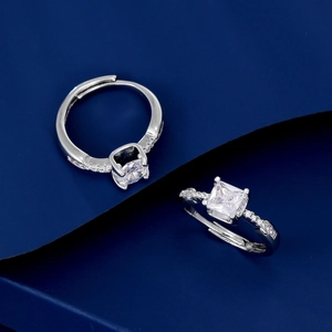 Elegant adjustable silver-tone ring set featuring square and round zircon center stones