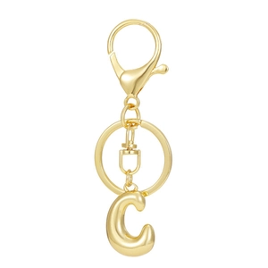 Detail view of gold 18K plated metal keychain with a 3D polished letter C pendant