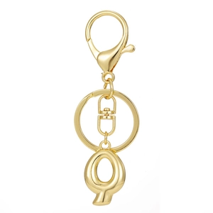 Detailed view of polished 18K gold plated letter Q keychain with a secure lobster clasp