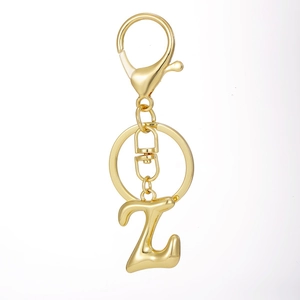 Polished 18K gold plated letter Z keychain with lobster clasp on a white background