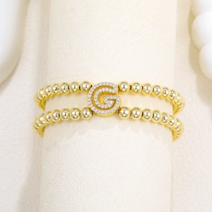 18k gold plated bubble bead bracelet featuring a sparkling paved letter G pendant charm