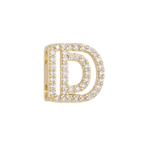 Macro shot of 18k gold plated bubble letter D slider charm with pavé cubic zirconia