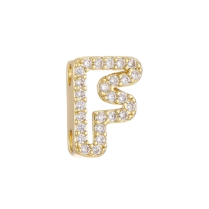 Macro shot of 18k gold plated bubble letter F bead charm with cubic zirconia pavé setting