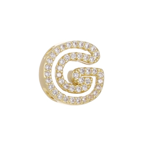 Detailed view of gold plated letter G bead charm with paved white zircon stones