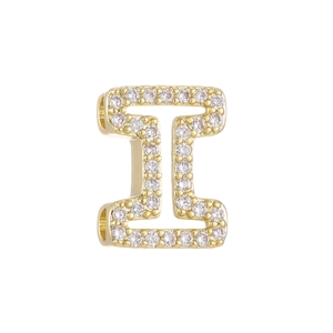 Detailed view of bubble initial I pendant with 18k gold plating and white cubic zirconia
