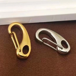 Polished stainless steel pear-shaped snap hooks in gold and silver for bags and keys