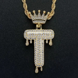 Hip hop gold necklace with crown and dripping letter T pendant inlaid with cubic zirconia