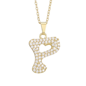 Macro shot of gold-plated letter P pendant necklace with sparkling zircons and heart detail