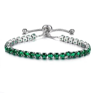 Adjustable 4mm green cubic zirconia tennis bolo bracelet in polished silver finish