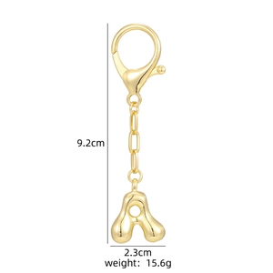 Detail of gold bubble letter A keychain pendant with dimensions and weight specs