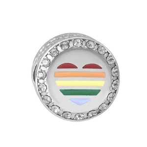 Macro shot of stainless steel rainbow heart charm with white zircon pavé setting