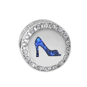Detailed macro view of silver bead charm with blue high heel inlay and sparkling crystals