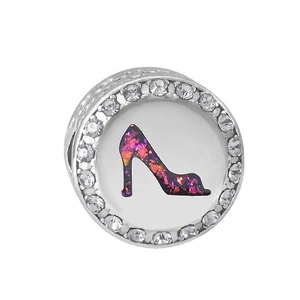 Detailed close-up of a silver charm with purple enamel stiletto and white zircons