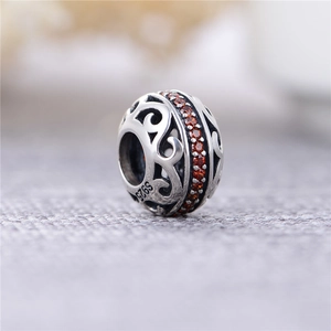 Perle en argent sterling 925 vintage avec motifs de volutes et zircons rouge orangé