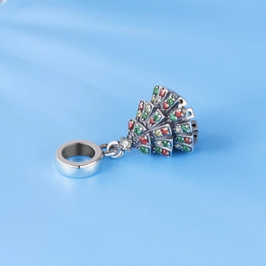 Macro view of a Christmas tree pendant with red, green, and white cubic zirconia stones