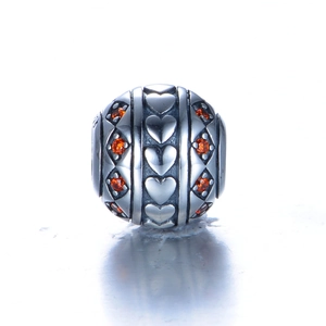 Charm cœur en argent massif S925 avec pierres oranges et finition oxydée vintage