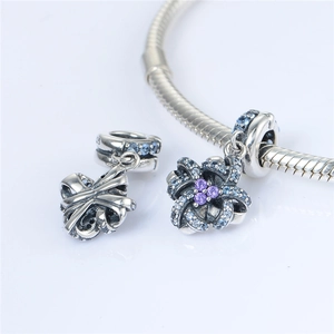 S925 sterling silver flower charm with blue zircon crystals on a snake chain bracelet