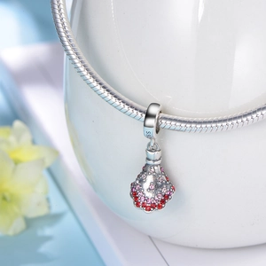 S925 sterling silver fan charm with pink and red crystals on a snake chain bracelet