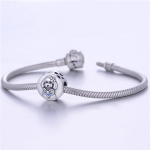 925 sterling silver poodle charm bracelet with blue stone bow and snake chain