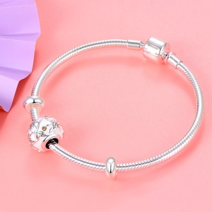 925 sterling zilveren slangenarmband met opengewerkte bloemenbedel en gele zirkoon
