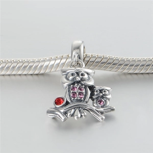 S925 sterling silver owl family charm with pink and red zircon stones on bracelet