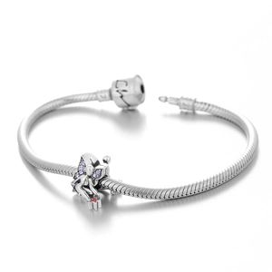 Silver snake chain bracelet with fairy charm featuring purple crystals and red gemstone detail